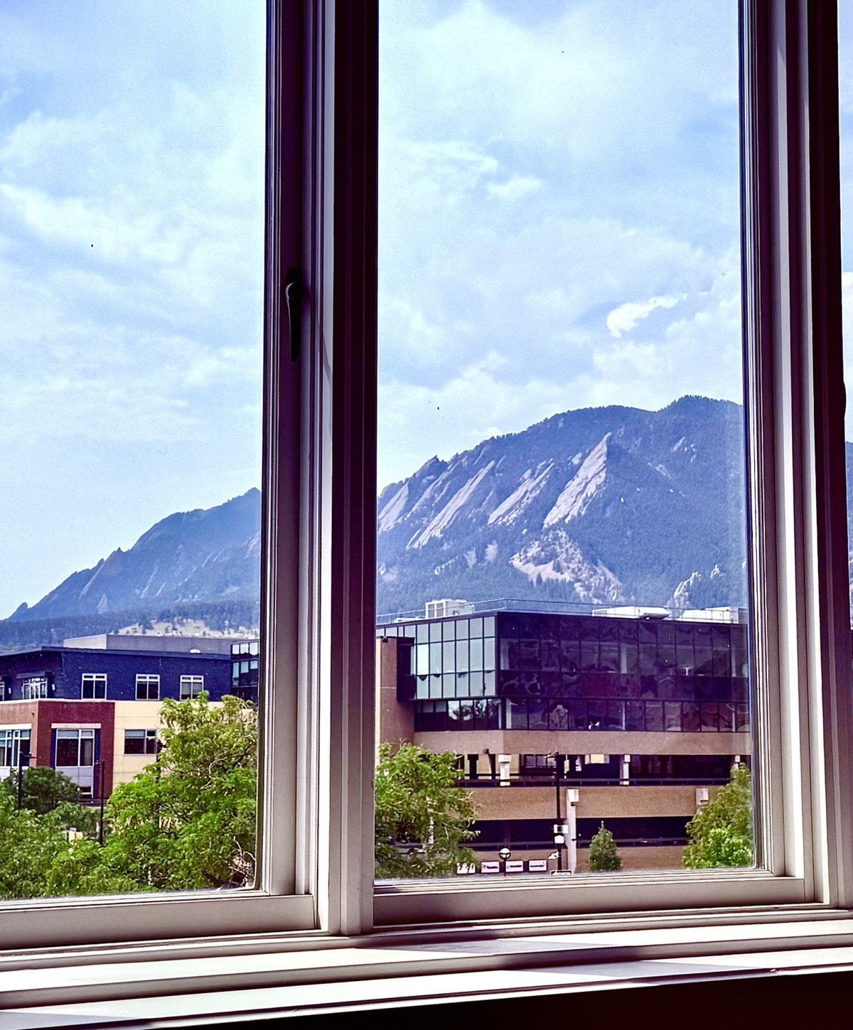The Flatirons seen from the Post Psychiatry office on Pearl Street in Boulder, Colorado